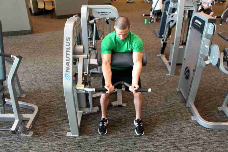 Machine Biceps Curl Exercise • Bodybuilding Wizard